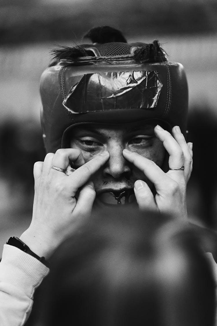 Hands Touching The Nose Of A Competitor