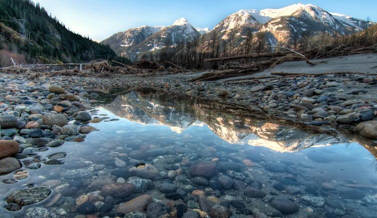 Lake Pebbles Under Body Of Water