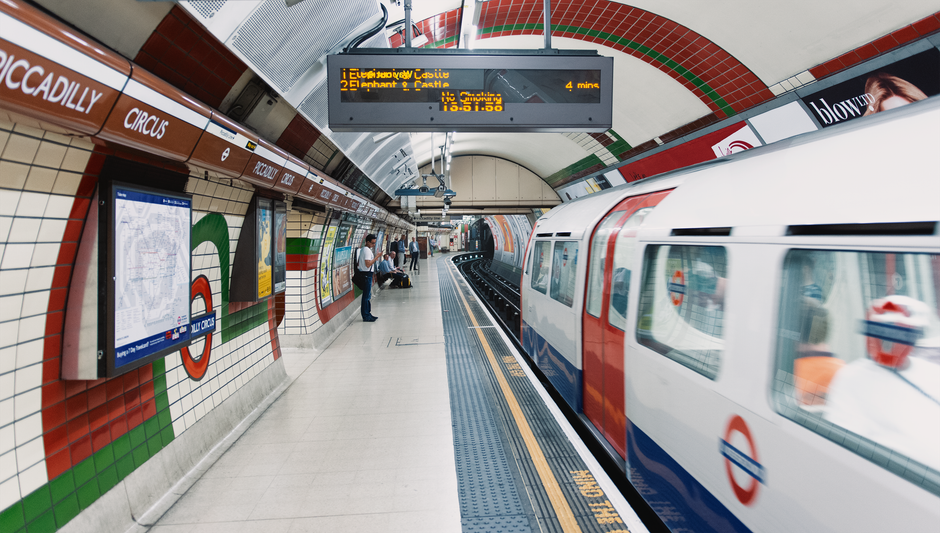 Motion blur of a train at Piccadilly Circus station in London’s underground subway system.
