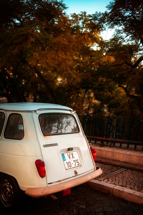 Vintage White Car on a Street 