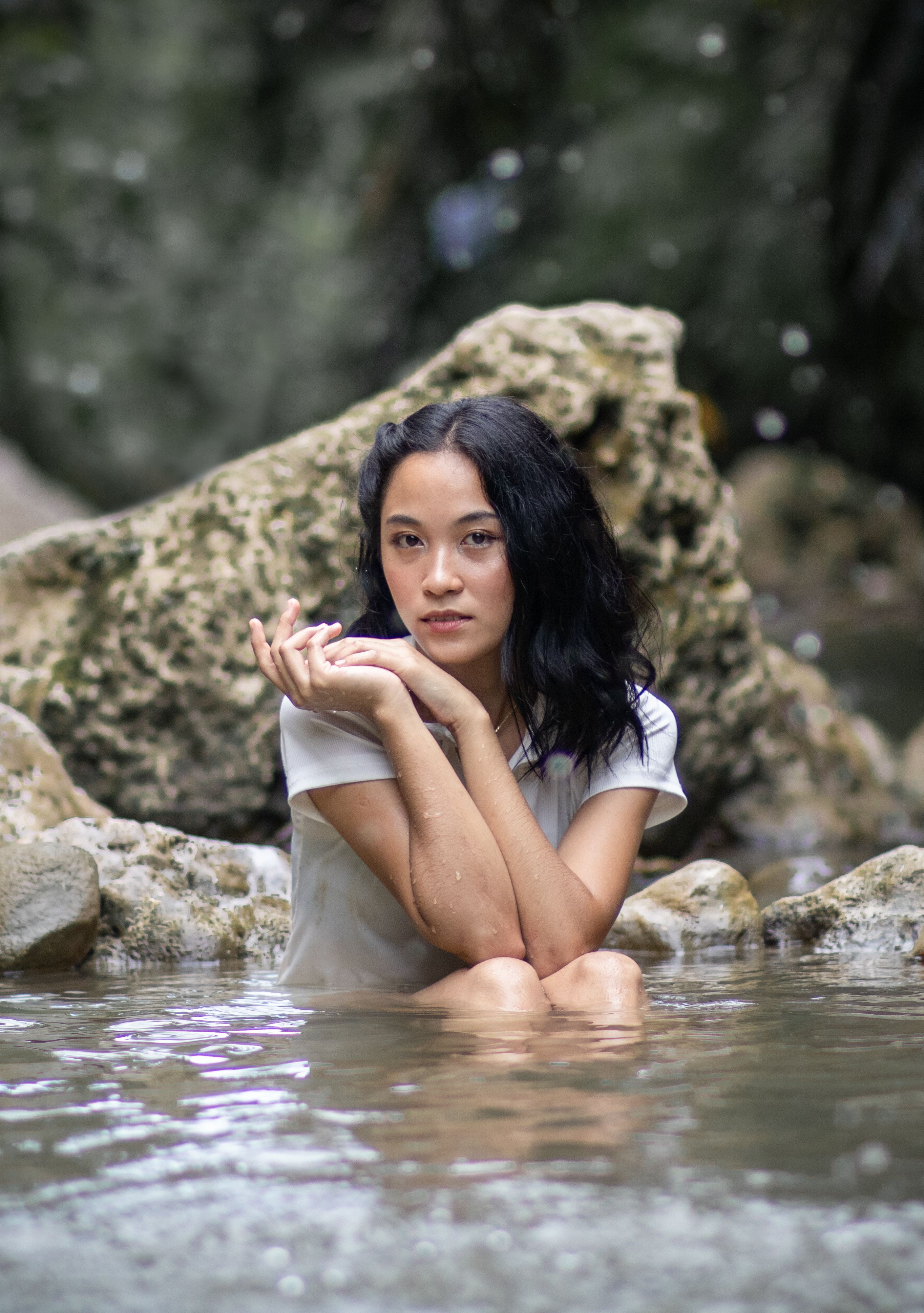 Woman Sitting in Water · Free Stock Photo
