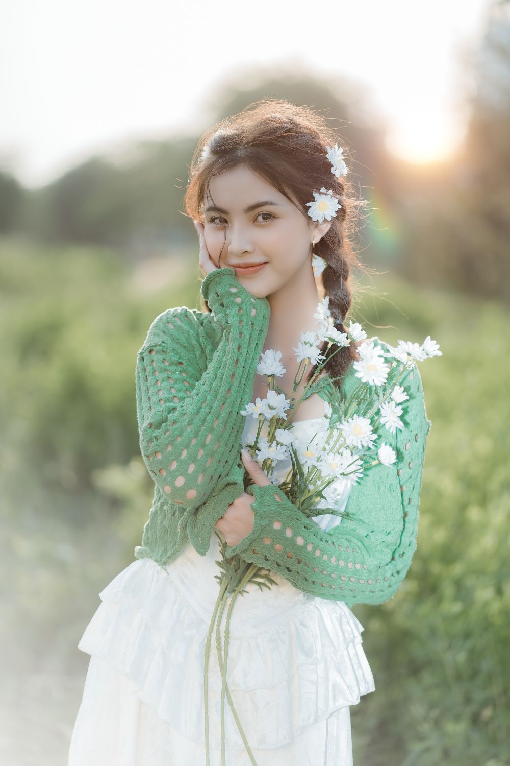 Portrait of Smiling Woman with Flowers · Free Stock Photo