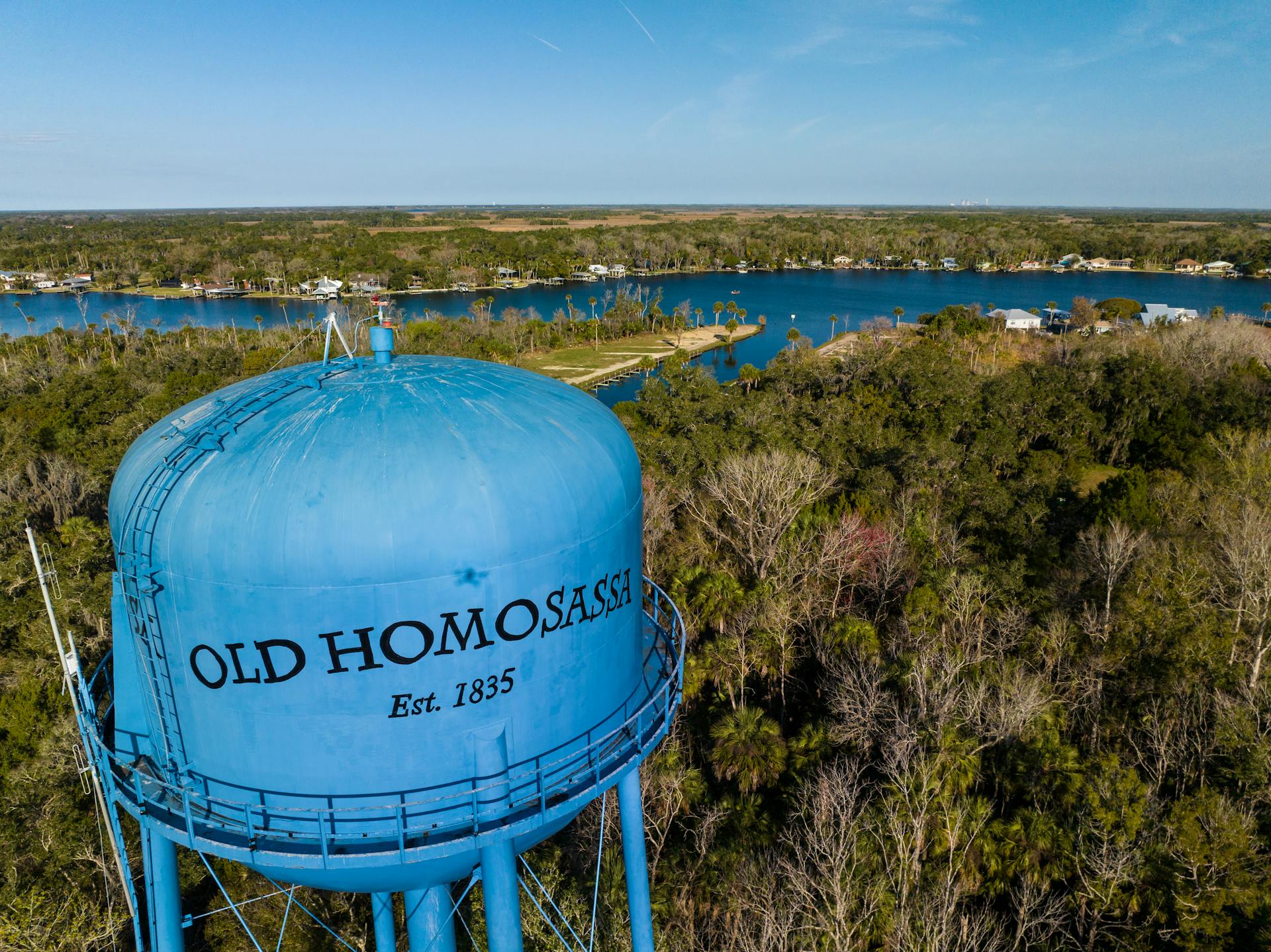 Drone shot of Old Homosassa water tank and surrounding river landscape, Florida.