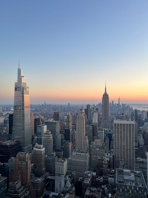 Free Aerial View of New York City Skyline at Sunset Stock Photo