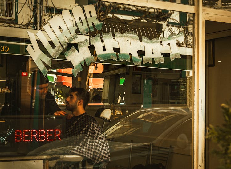 Shiny Window Of A Barber Shop