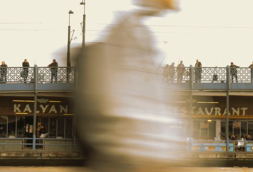 Free Motion blur of a person walking near a bridge in Istanbul, Turkey. Stock Photo