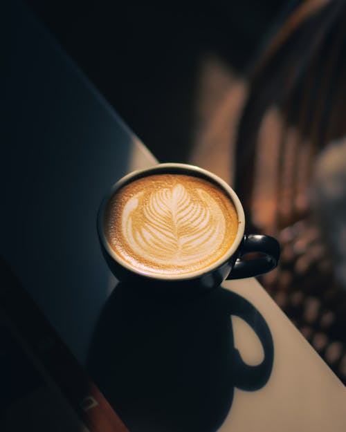 Close-up of a Cup of Coffee with Latte Art 