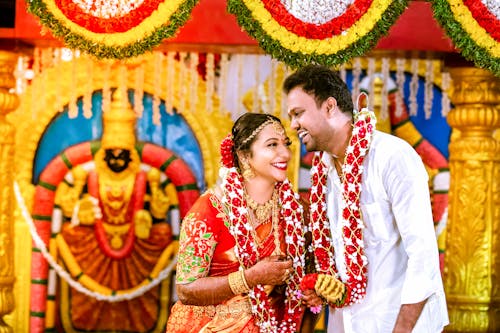 Smiling Couple in Traditional Clothing