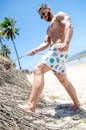 Topless Man Near Beach
