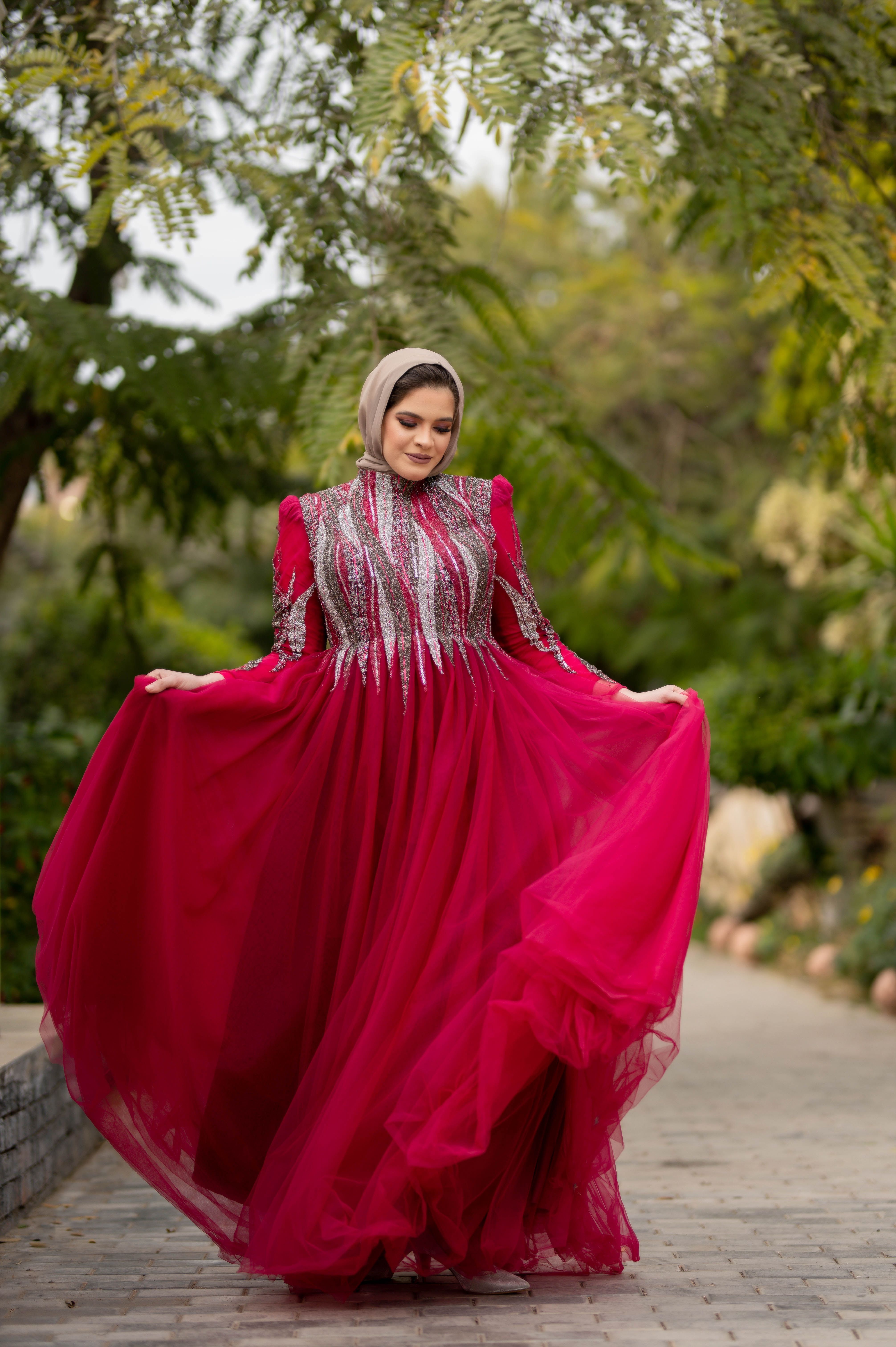 Woman Posing in Red Dress and Hijab  Free Stock Photo