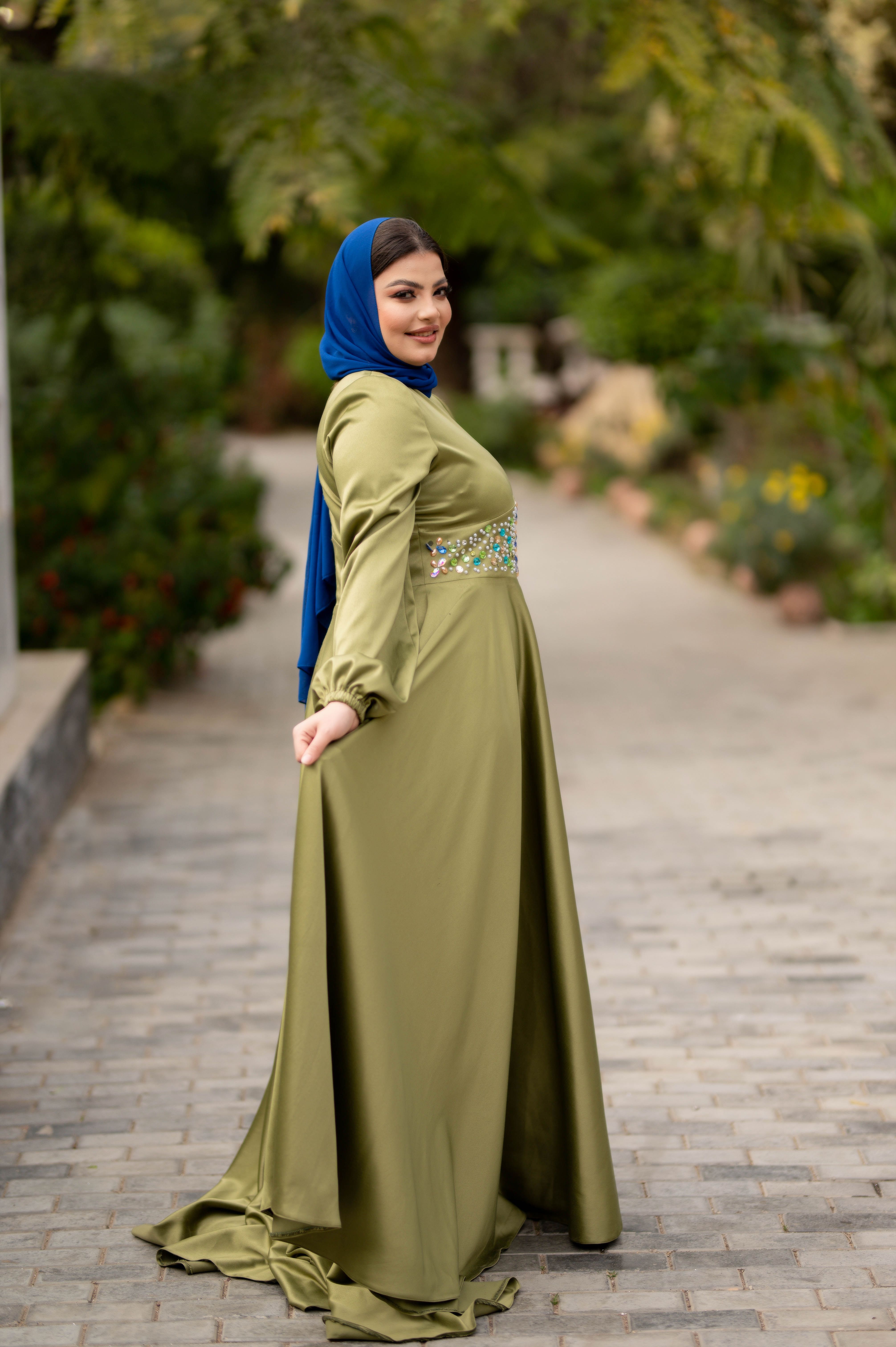 Smiling Woman in Green Dress  Free Stock Photo