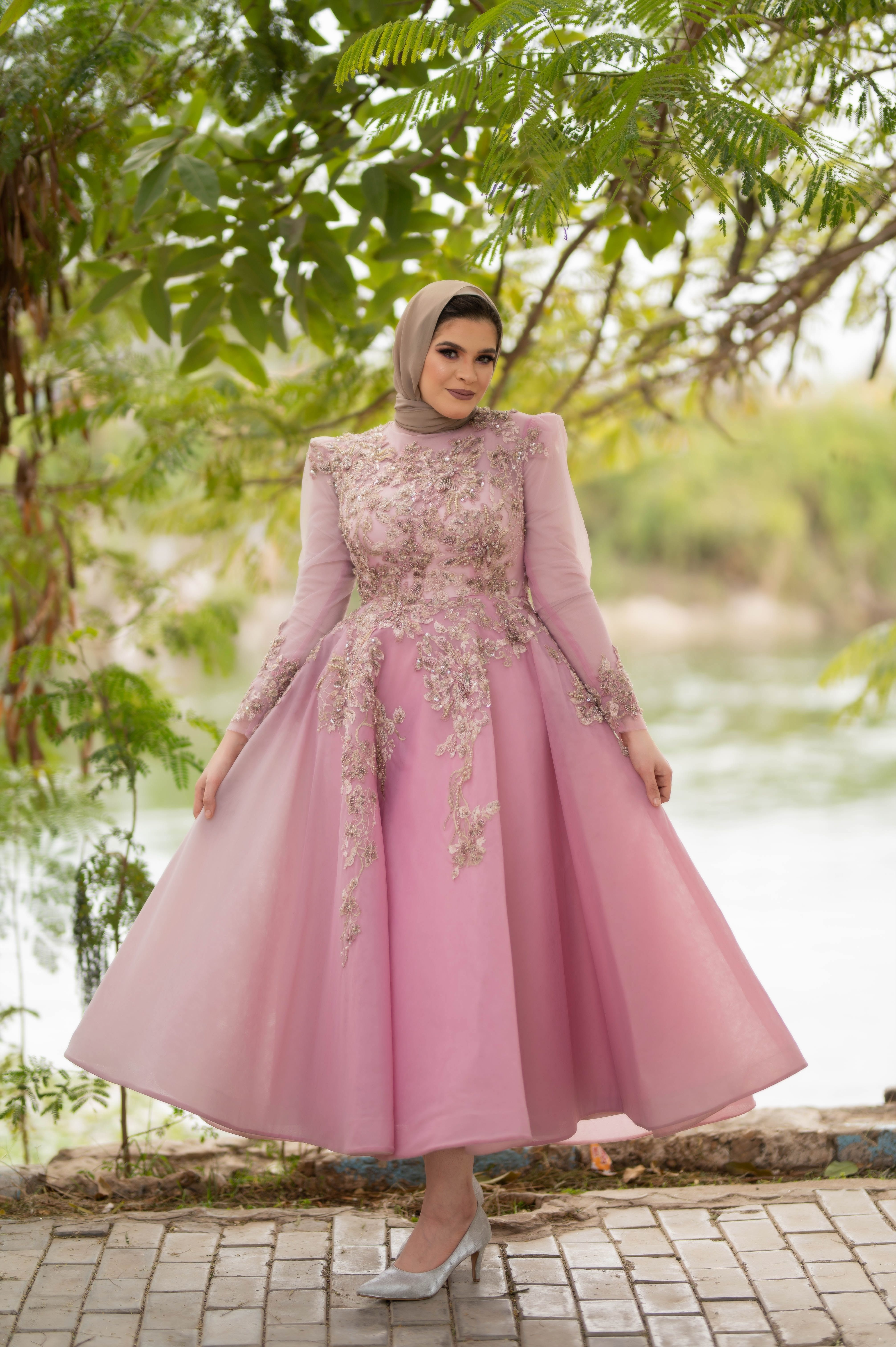 Woman Posing in Pink Dress and Hijab · Free Stock Photo