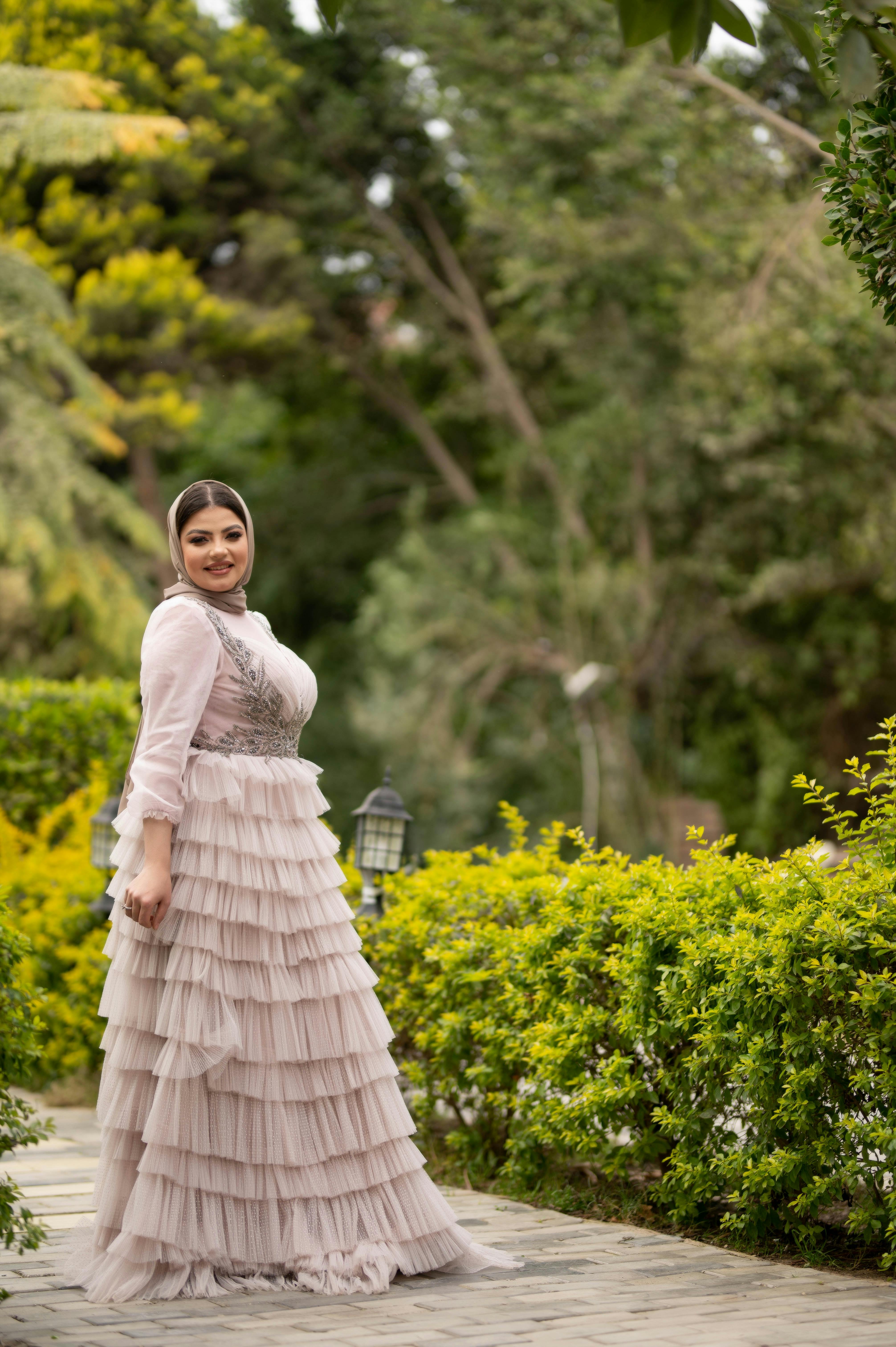 A woman sitting in the garden 2045032 Stock Photo at Vecteezy