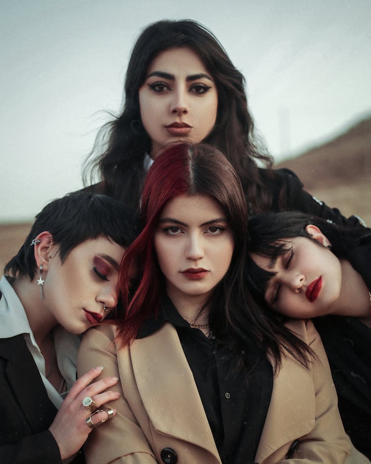 A Group Of Young Women Posing Together