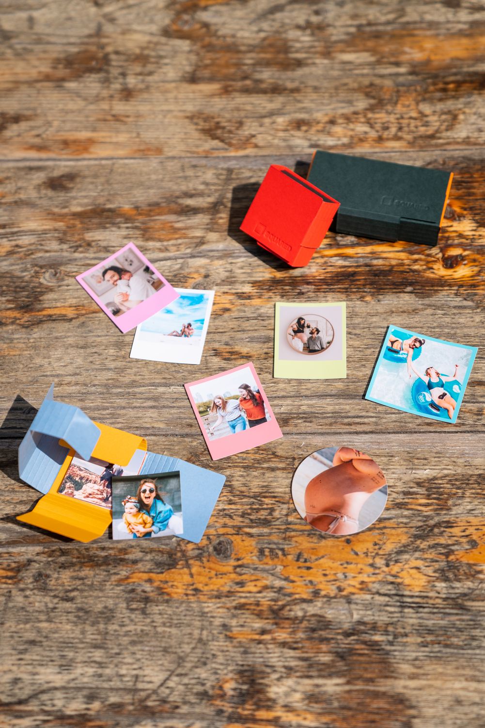 Scattered Photo Layout Photographs Scattered on a Desk · Free Stock Photo