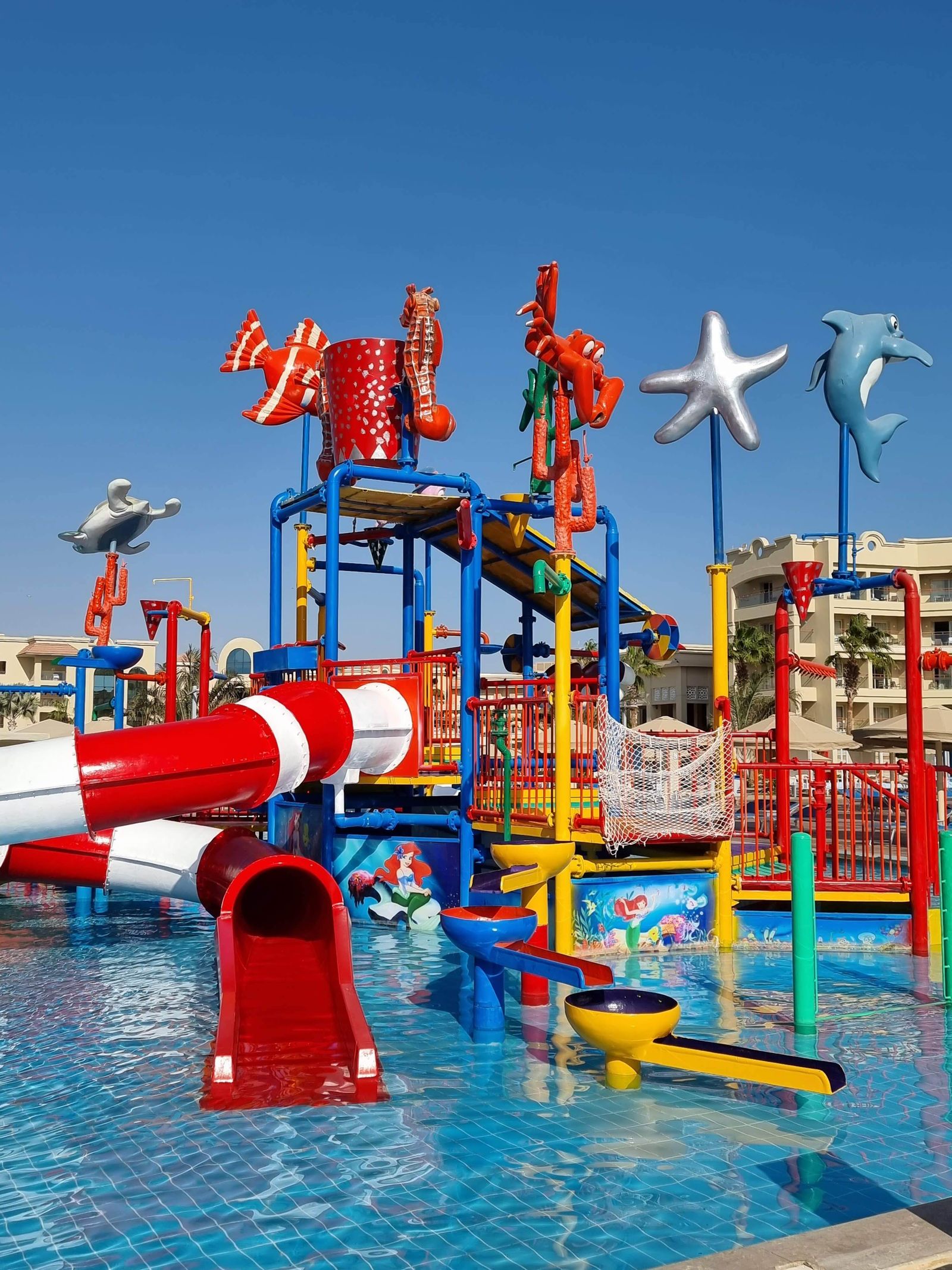 Family-friendly water play area with slides