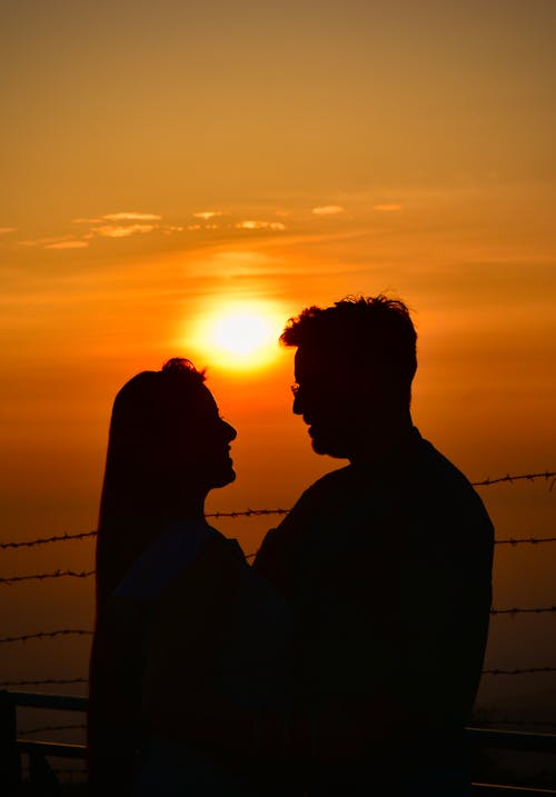 Silhouette of Couple During Sunset 