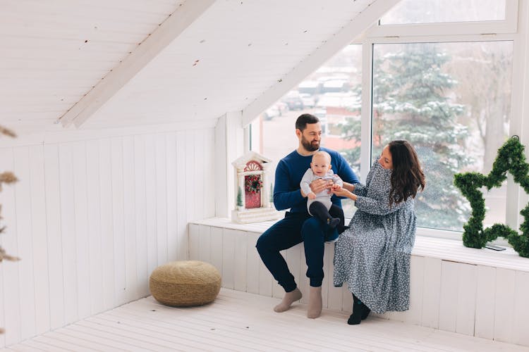 Family With Baby At Christmas