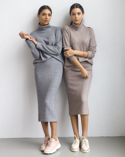 Women Posing in Turtleneck Dresses 