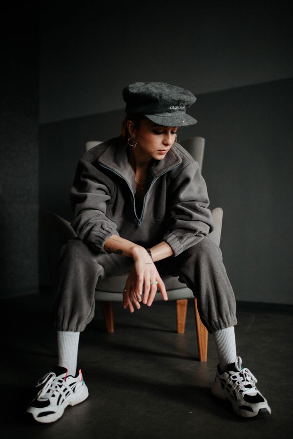Woman in a fleece quarter-zip with corduroy joggers