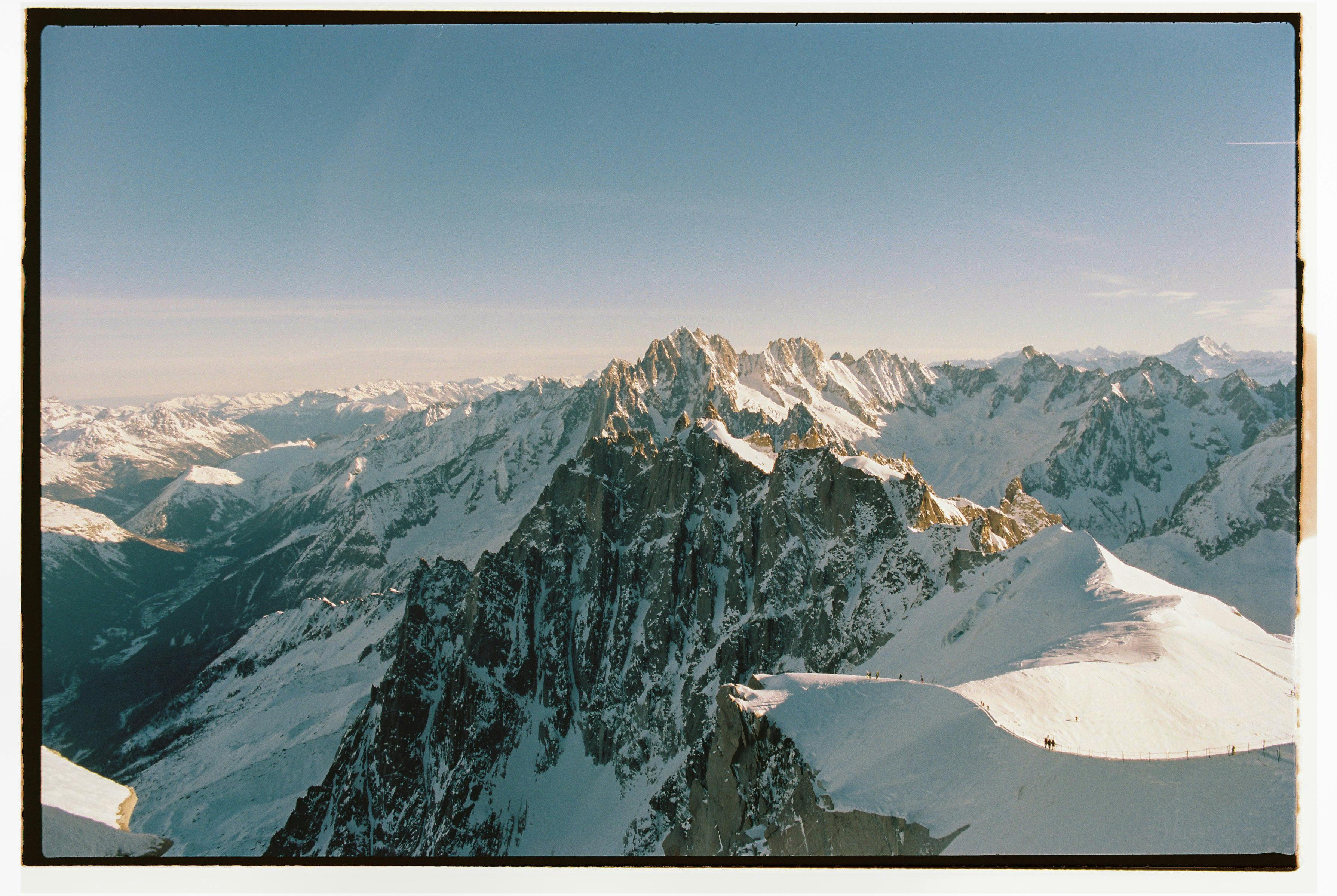 Stunning aerial vista of Mont Blanc's snow-covered peaks in winter. Captivating natural beauty.