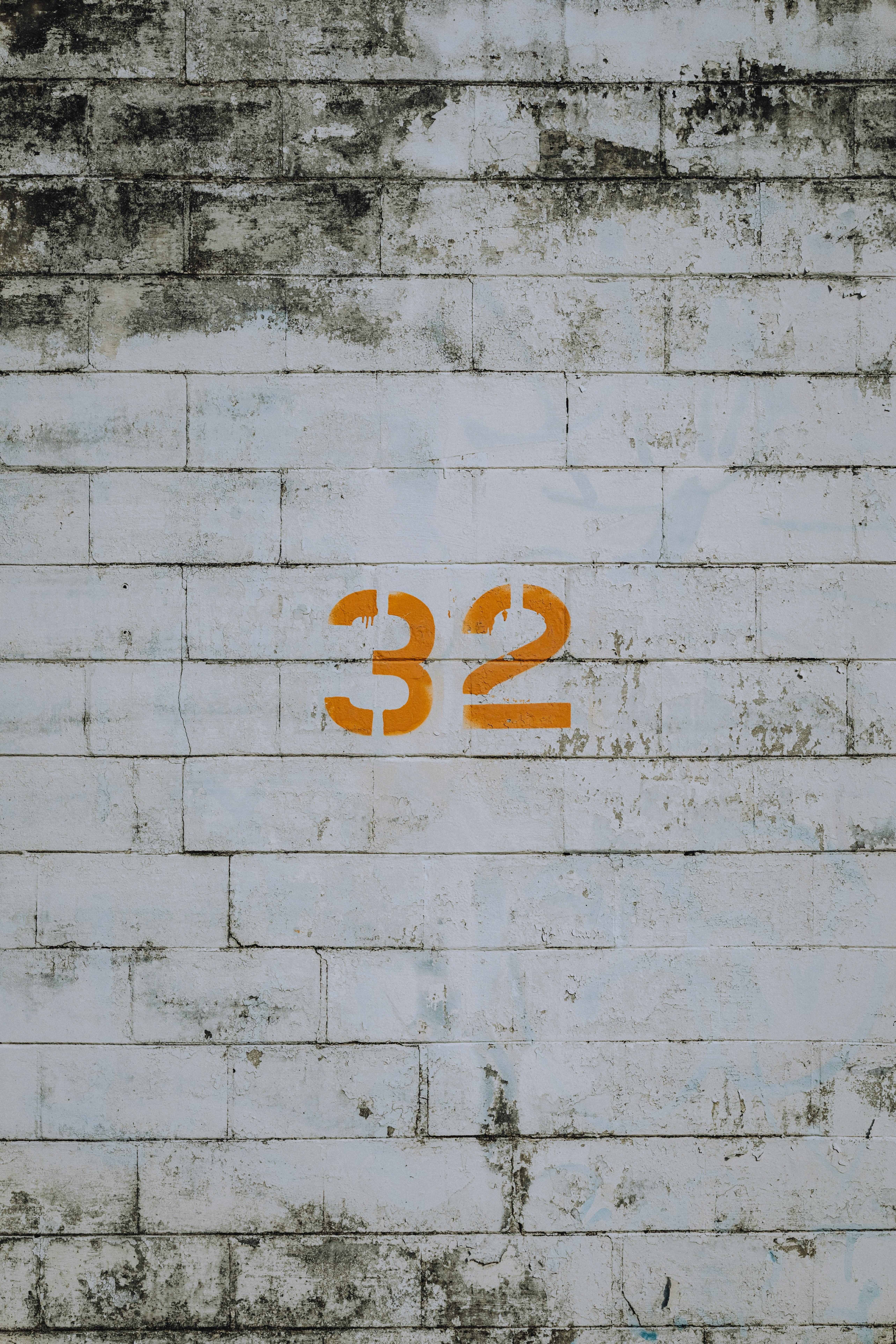 free photo of number 32 painted on a wall