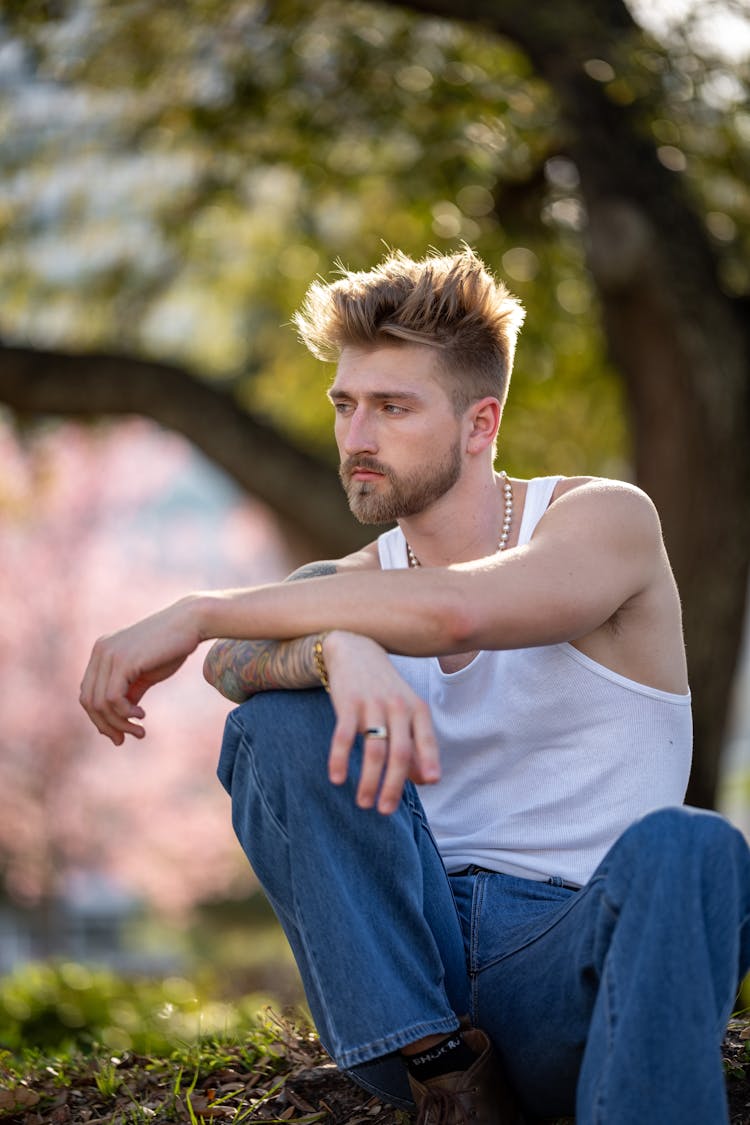 Man Sitting And Posing