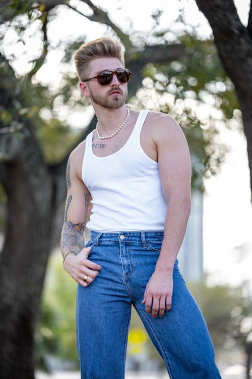 Man Posing in Jeans and with Tank Top