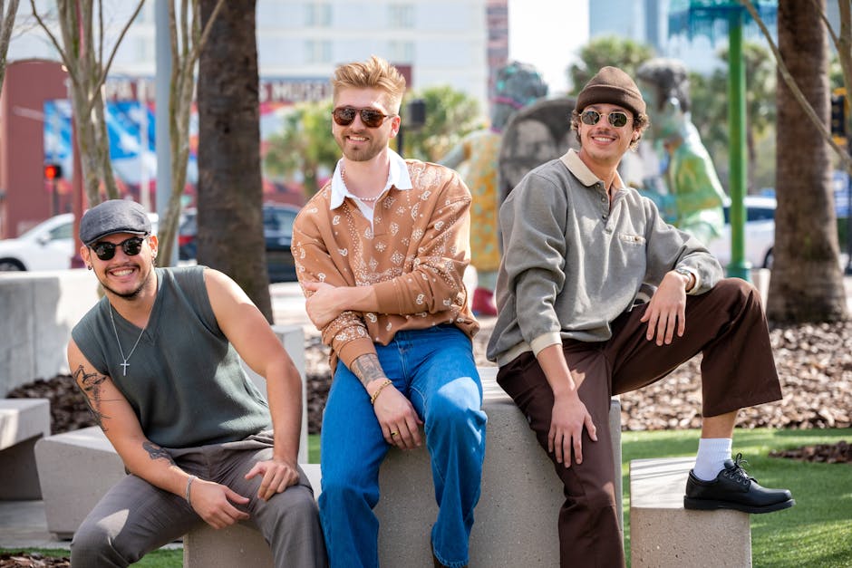 A group of friends laughing and pointing at a map in downtown Auckland