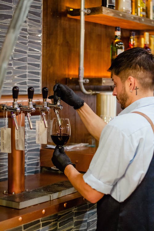 Bartender Pouring Red Wine