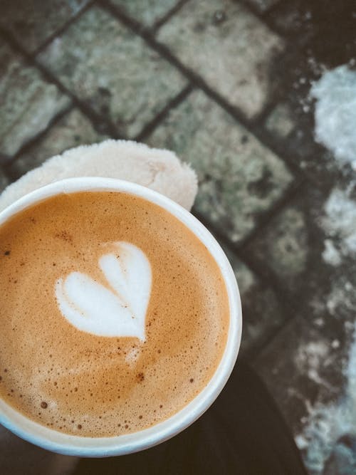 A Coffee with a Heart from Milk Foam 
