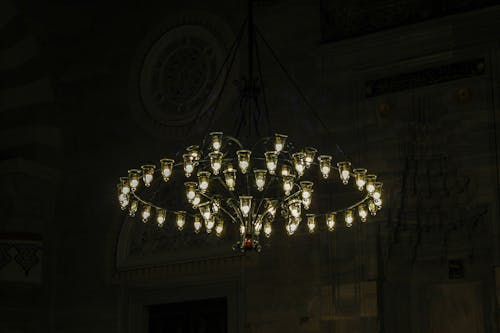 Illuminated Chandelier in Dark Interior