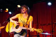 Photo of Woman Playing Guitar
