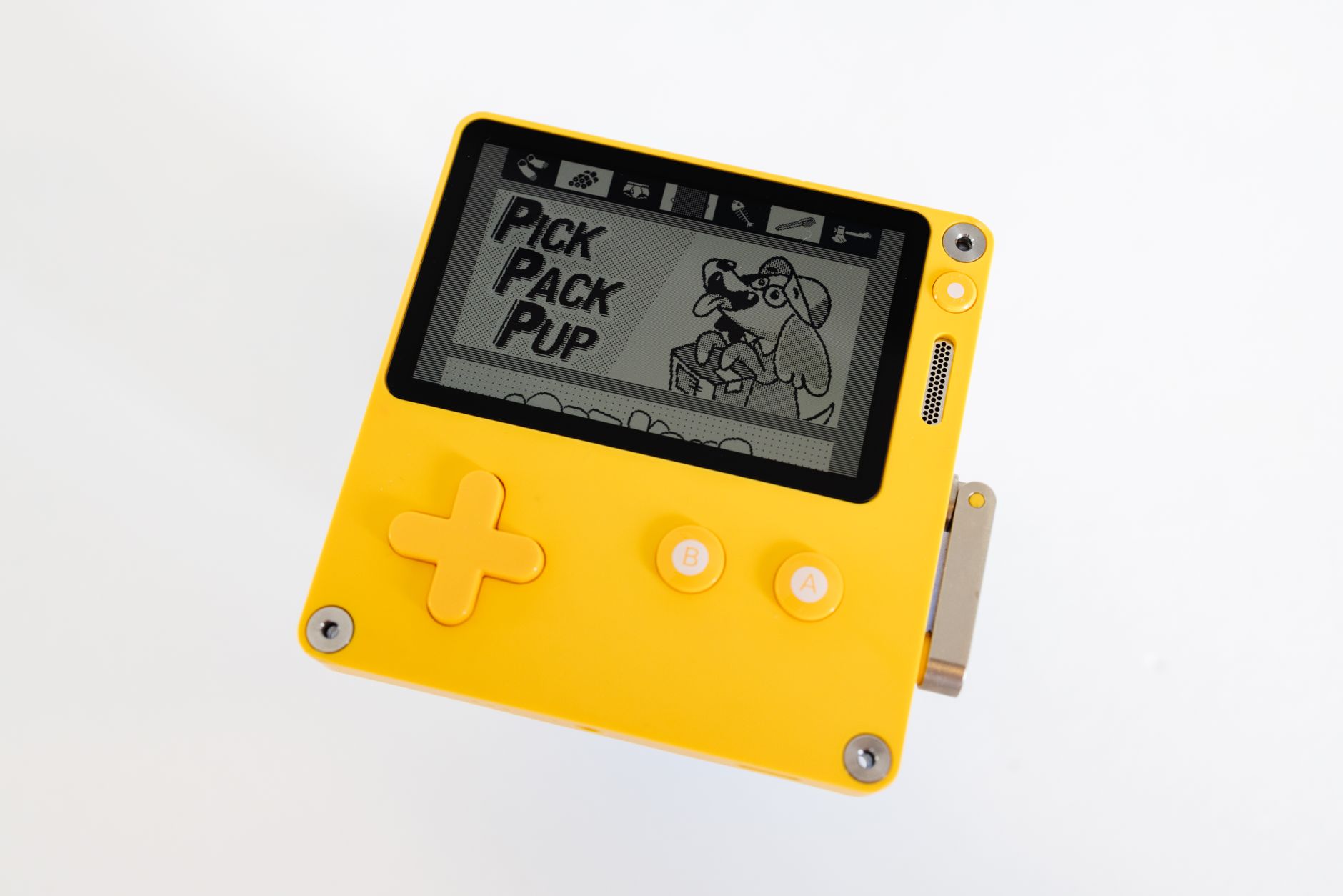 Vibrant yellow handheld console displaying a retro game screen. Perfect for gaming enthusiasts.