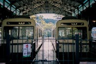 Two White Trains Inside Train Station