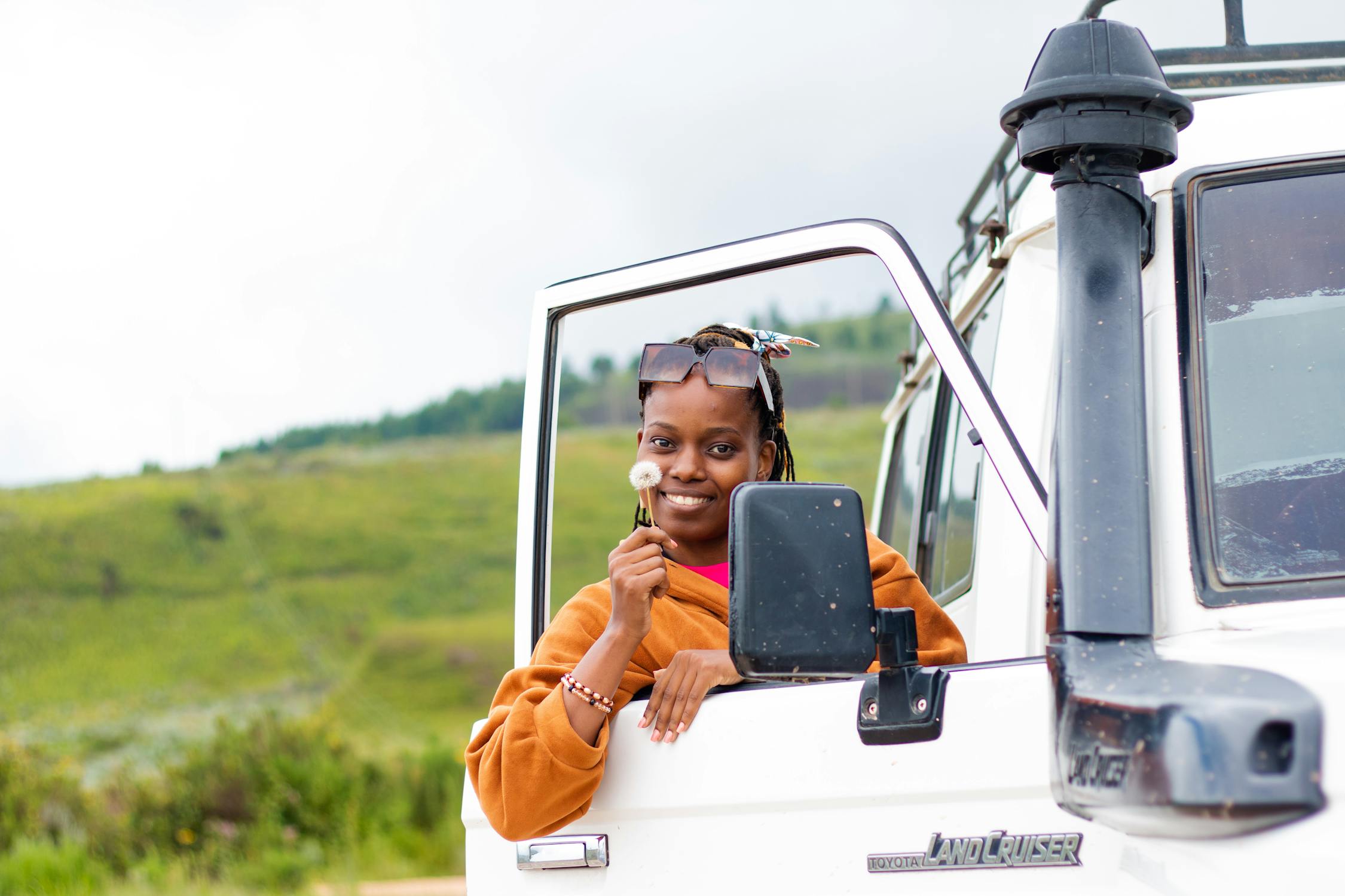 What Teens Need to Know About Going to College Out of State 1 free photo of woman standing in open doors of truck