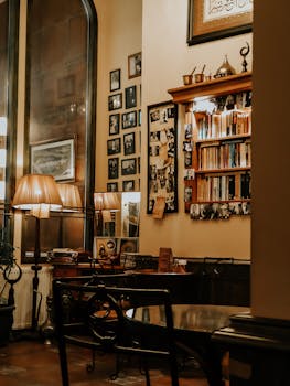 A cozy vintage interior featuring a bookshelf and warm lighting, evoking nostalgia and classic charm.