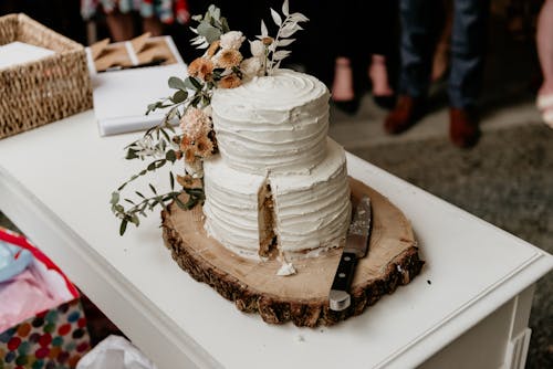 White Wedding Cake on a Cutting Board