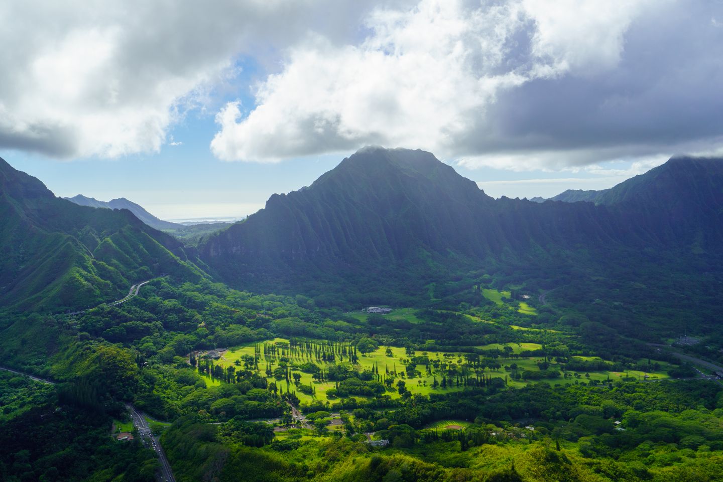 Green upland valley under low cloud, the cooler country above the coast