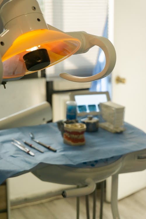 A Lamp and Medical Instruments in a Dental Office