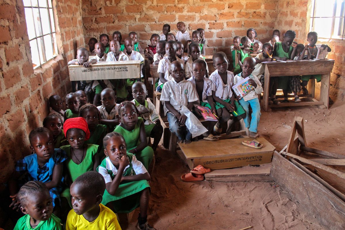 Children learning together in a rustic village school