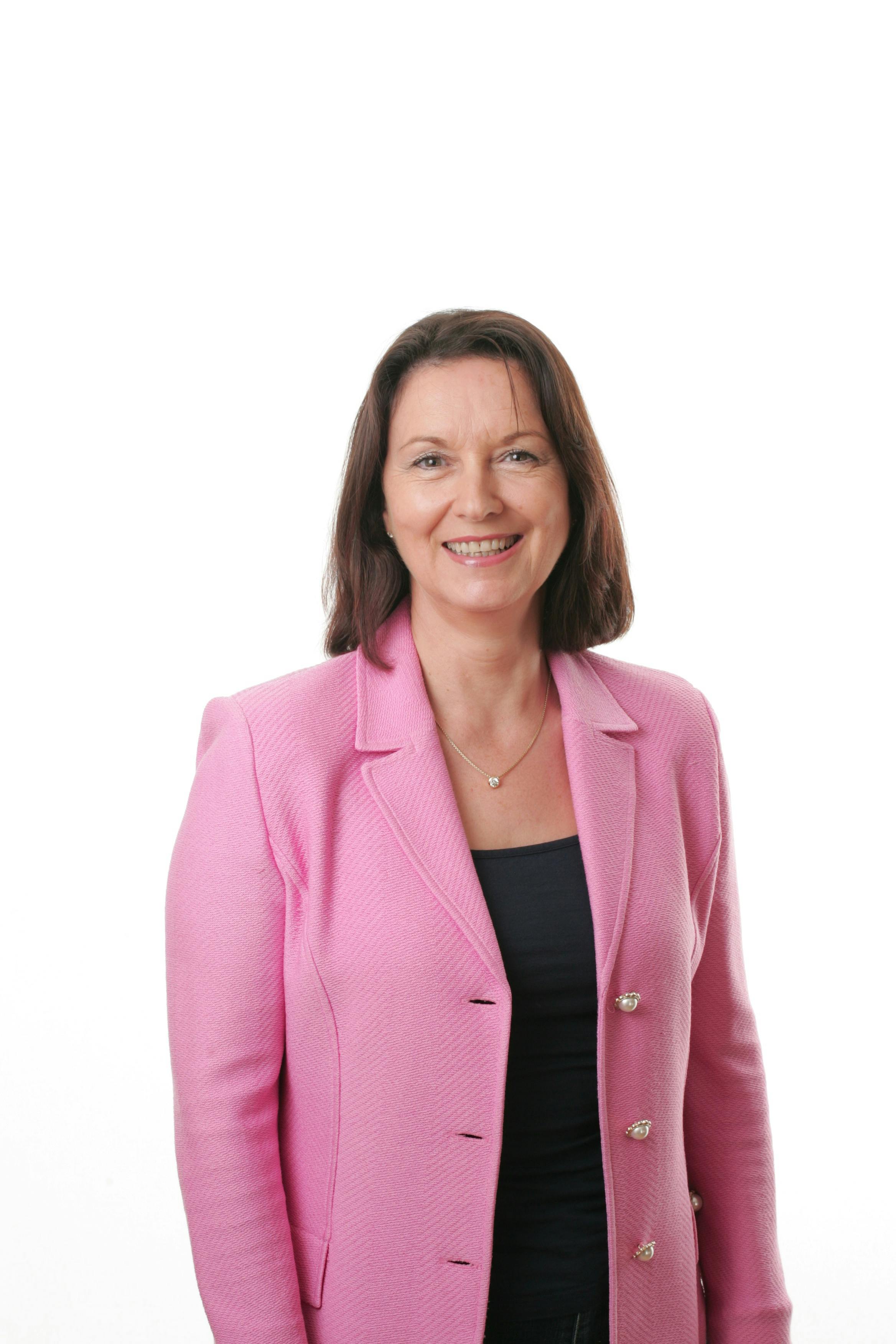 Woman in Black Scoop Neck Shirt Smiling \u00b7 Free Stock Photo