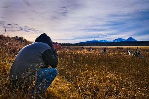 Man Taking Picture Outdoors