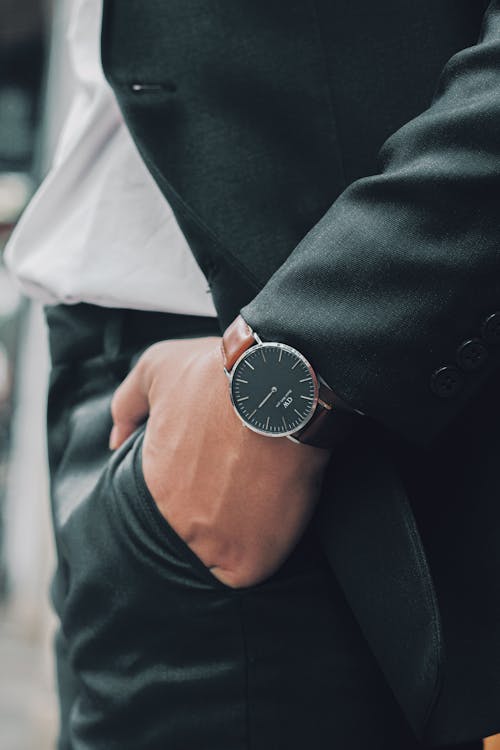 Close-up of an Elegant Man Wearing a Wristwatch Holding His Hand in the Pocket