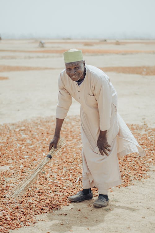 Smiling Man in Traditional Clothing