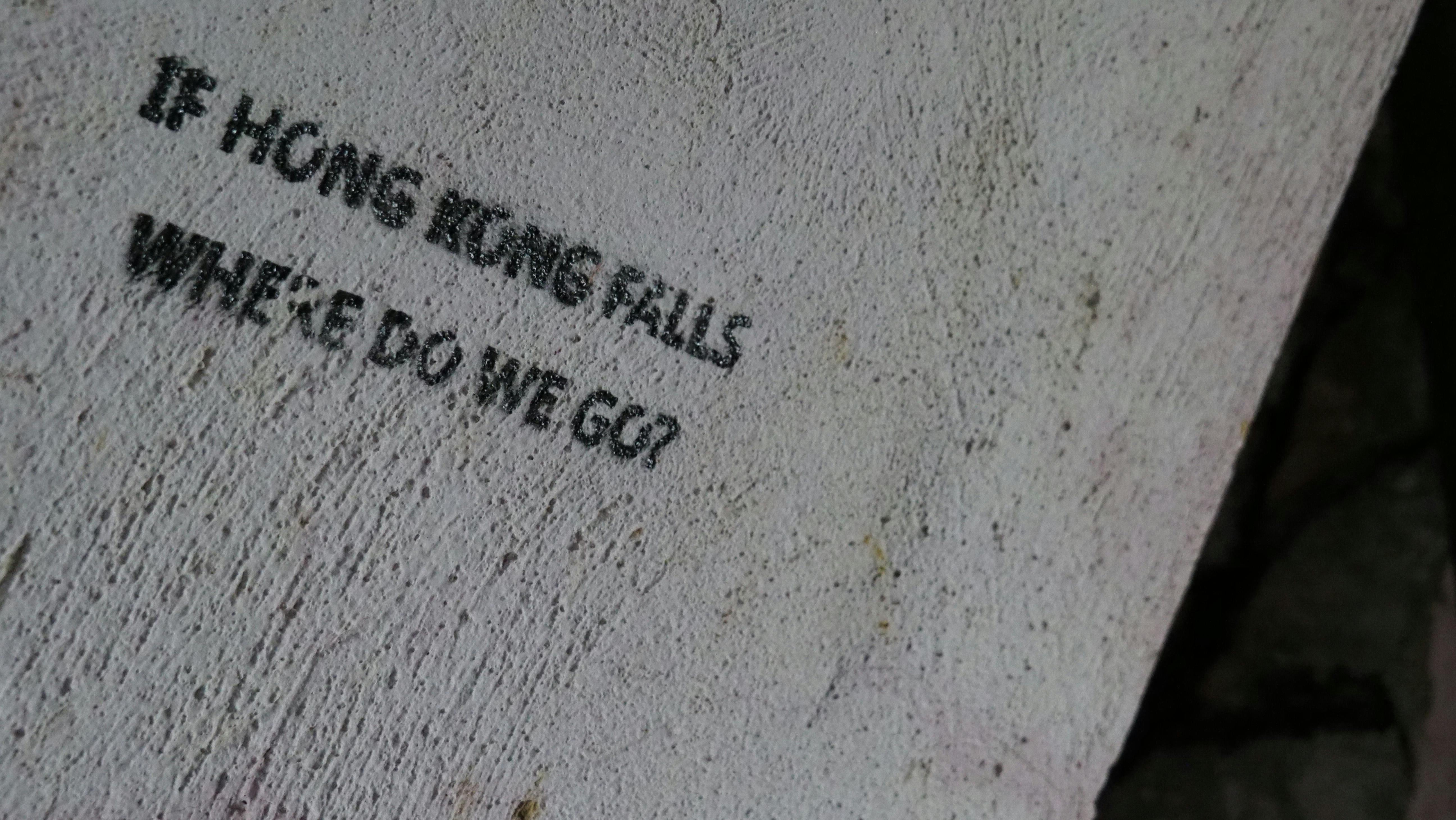 A soldier in tactical gear stands in a war-torn, fiery urban environment, representing a scene from Battlefield.