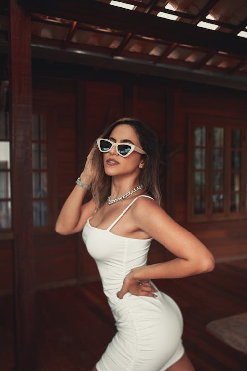 Young Woman in a White Bodycon Dress 