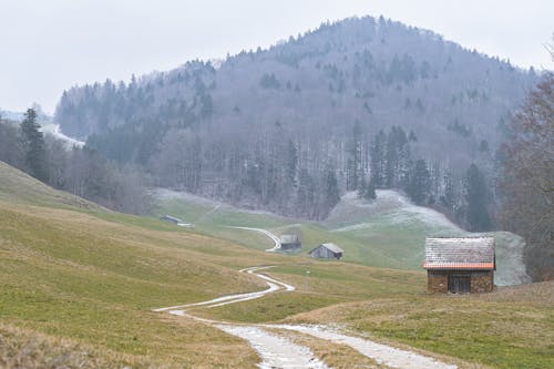 A Trail and Huts in Mountains