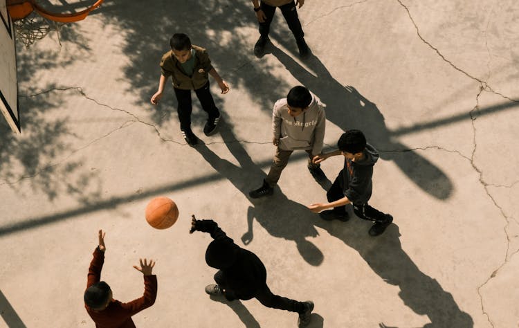 Boys Playing Basketball