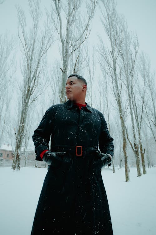 Man in Black Coat in Winter